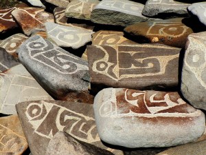 Ali in Tibet with Mani stones